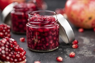 Some fresh preserved Pomegranate seeds (selective focus, close-up shot)