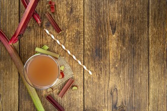 Portion of fresh made Rhubarb Juice (close up shot, selective focus)