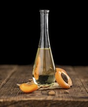 Some Apricot Kernel Oil as detailed close up shot (selective focus)
