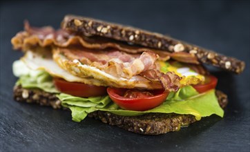 Portion of Bacon and Eggs (selective focus, close-up shot)