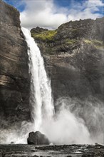 Haifoss waterfall in western Iceland at a cloudy summer day