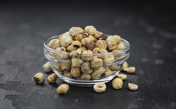 Peeled Hazelnuts as detailed close up shot (selective focus)