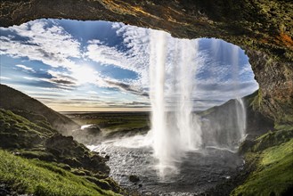 Seljalandsfoss waterfall in south Iceland during a sunset