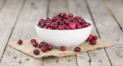 Portion of healthy Dried Cranberries (selective focus, close-up shot)