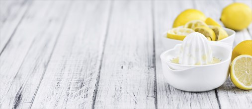 Fresh made Juice (lemon) on a vintage background (close-up shot)