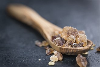 Portion of brown Rock Candy as detailed close-up shot (selective focus)