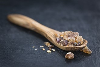 Slate slab with brown Rock Candy (close-up shot, selective focus)