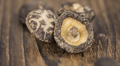 Some homemade Shiitake mushrooms (dried) as detailed close-up shot, selective focus