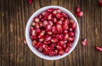 Portion of Pomegranate seeds (close-up shot, selective focus)