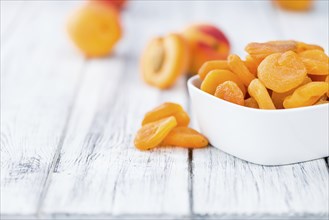 Portion of fresh Dried Apricots (close-up shot, selective focus)