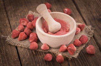 Instant Strawberries on a vintage background as detailed close-up shot, selective focus