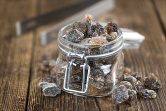 Portion of brown Rock Candy as detailed close-up shot (selective focus)