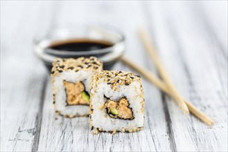 Portion of fresh made Sushi (detailed close-up shot, selective focus)