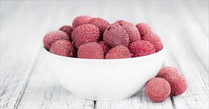 Portion of fresh Lychees (close-up shot, selective focus)