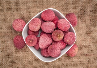 Portion of fresh Lychees (close-up shot, selective focus)