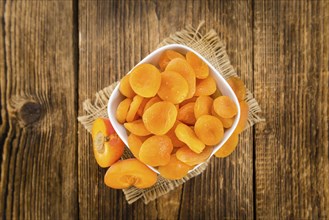 Portion of fresh Dried Apricots (close-up shot, selective focus)