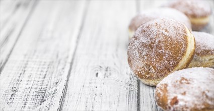 Portion of Berliner Doughnuts as detailed close-up shot, selective focus