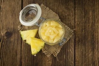 Portion of fresh Preserved Pineapple pieces close-up shot, selective focus