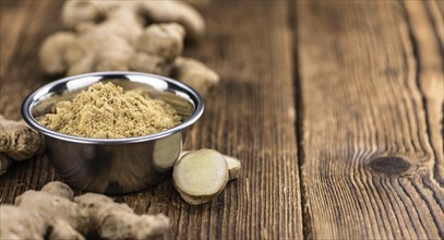 Some healthy Ginger Powder (selective focus, close-up shot)