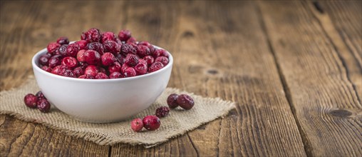 Portion of Dried Cranberries as detailed close-up shot, selective focus