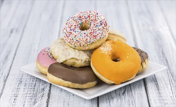 Fresh made Donuts as detailed close-up shots (selective focus)