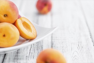 Portion of fresh Apricots (close-up shot, selective focus)