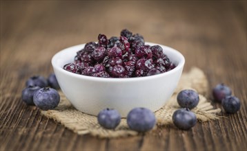 Fresh made Blueberries (preserved) on a vintage background as detailed close-up shot