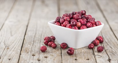 Portion of healthy Dried Cranberries (selective focus, close-up shot)