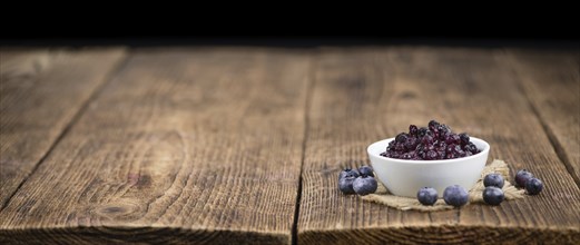 Fresh made Blueberries (preserved) on a vintage background as detailed close-up shot