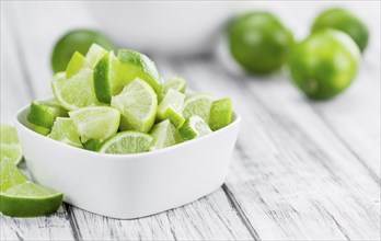 Sliced Limes (selective focus, close-up shot)