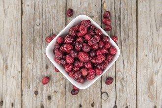 Portion of healthy Dried Cranberries (selective focus, close-up shot)