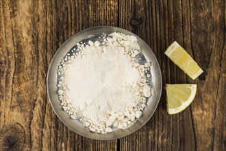 Portion of healthy Lemon powder (selective focus, close-up shot)