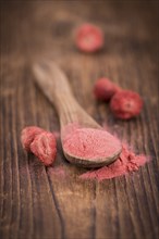 Instant Strawberries on a vintage background as detailed close-up shot, selective focus