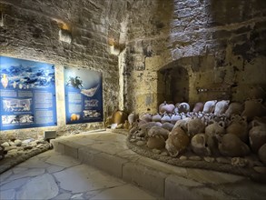 View of ancient amphorae from old historical shipwreck recovered in Mediterranean Sea wreck sunk in