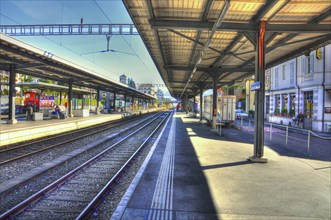 Railroad Station with Rail Tracks in a Sunny Day in Locarno, Ticino, Switzerland, Europe