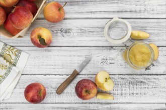 Portion of homemade Applesauce (selective focus, close-up shot) on vintage background