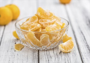 Portion of tangerines (close-up shot) on a vintage background (selective focus)
