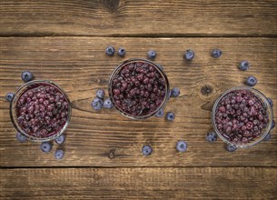 Fresh made Blueberries (preserved) on an old and rustic wooden table, selective focus, close-up