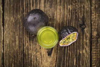 Passion Fruit Liqueur (fresh made) as detailed close-up shot, selective focus