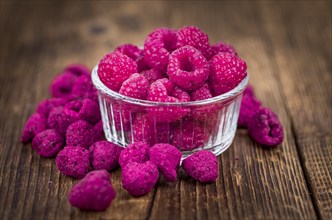 Some homemade Raspberries (dried) as detailed close-up shot, selective focus
