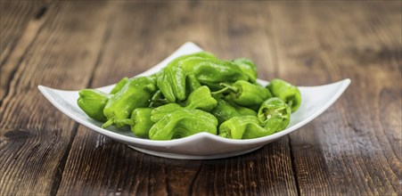 Portion of fresh Raw Pimientos close-up shot, selective focus