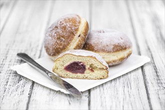 Berliner Doughnuts (fresh made) as detailed close-up shot, selective focus