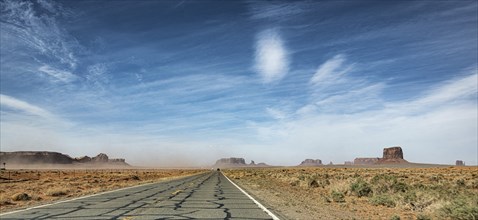 Road in Monument Valley, Arizona, USA at a cloudy day