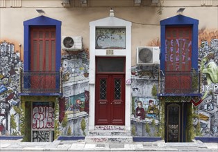 Painted facade of an old residential building in Exarchia, student and alternative neighbourhood,