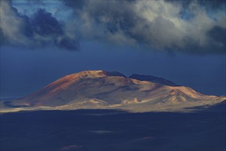Sunrise in the Fire Mountains, volcanic landscape in Timanfaya National Park, Lanzarote, Canary