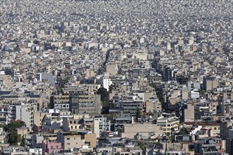 Sea of houses in a densely built-up metropolis, symbolic image of a concrete desert, Athens,