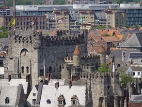 Medieval castle with battlements and towers in the centre of a town, Ghent, Belgium, Europe