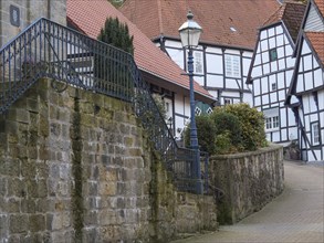 Historic old town with half-timbered houses, lanterns and stone steps, Tecklenburg, North