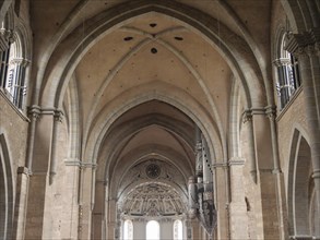 Interior view of a church with Gothic architecture, impressive vaulted arches and high windows,