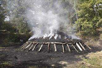 Smoking coal pile